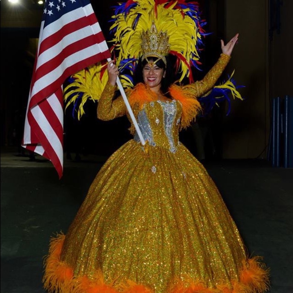Gold gown with gold jacket